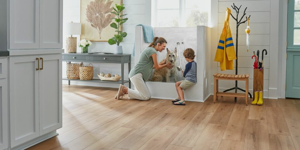 Mom and kid bathing dog | Vision Flooring