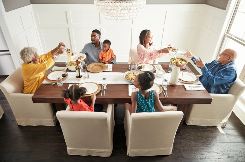 Family enjoys meal | Vision Flooring