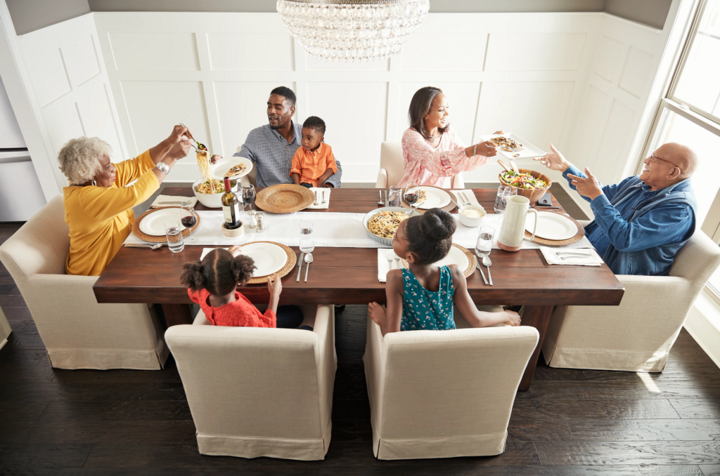 Family enjoys meal | Vision Flooring